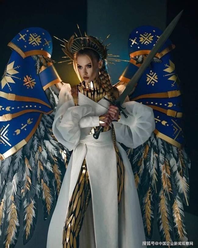 俄乌选美小姐交锋:拒绝近身合影 乌环球小姐以“光明战士”造型参赛-第2张图片-9158手机教程网 俄乌选美小姐交锋:拒绝近身合影 乌环球小姐以“光明战士”造型参赛-第2张图片-9158手机教程网